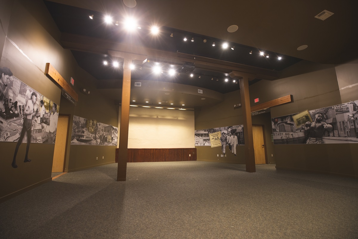 A photo of the theatre room at Voices of Pensacola. The room is empty.